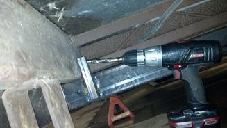 Drill holes though frame
